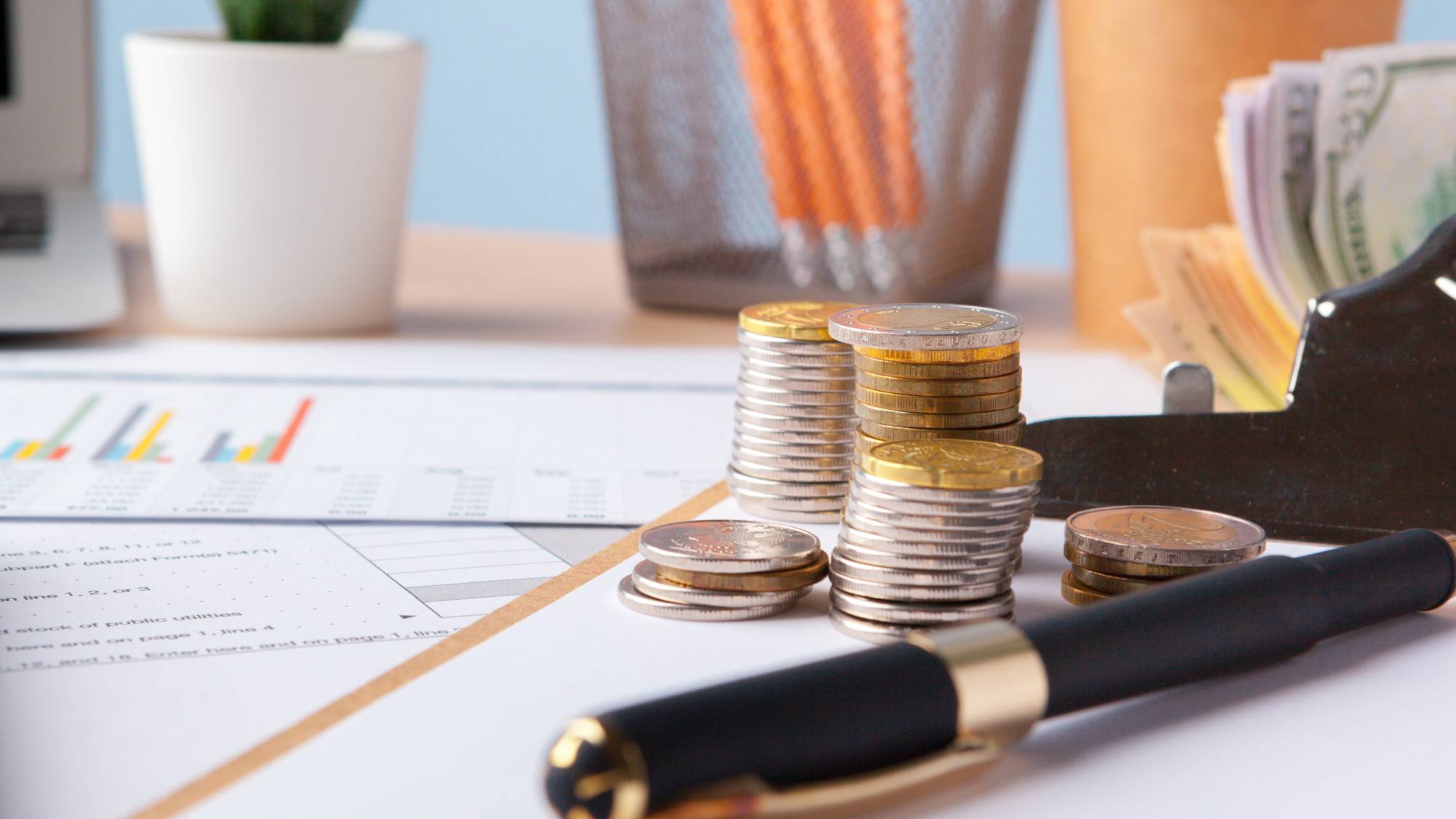 saving stack coins money graph chart document close up 1, EntrepreNerd